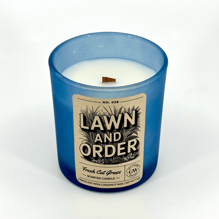 Candle with a blue glass container and &