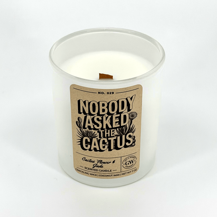 Candle with a label reading &