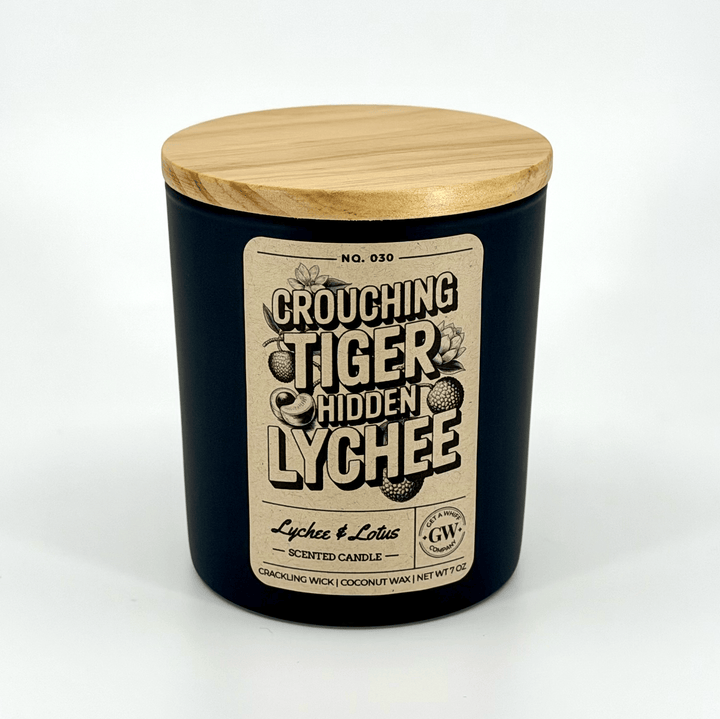 Candle jar with wooden lid and label on a white background