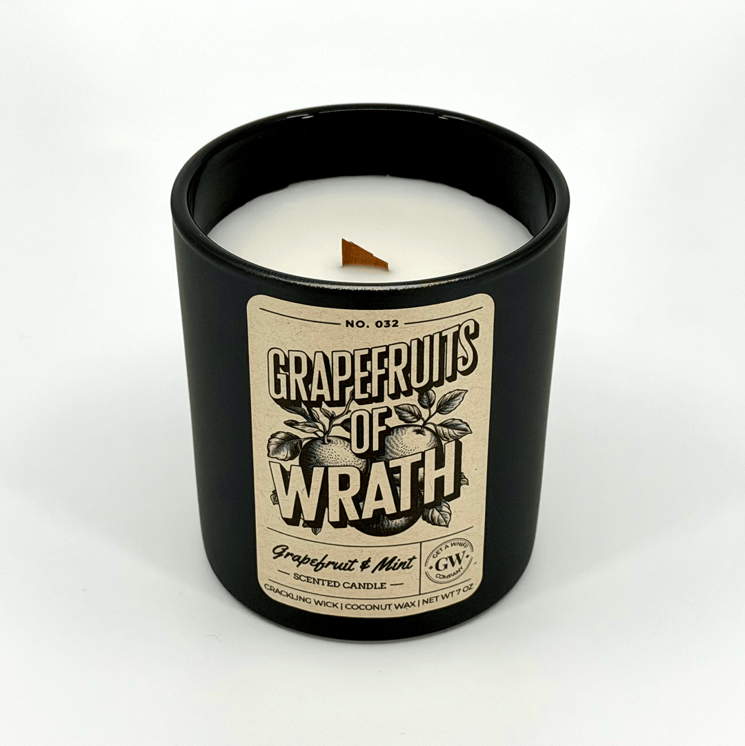Grapefruits of Wrath candle in a black container on a white background