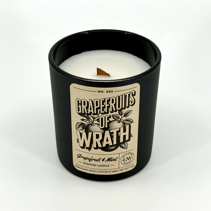 Grapefruits of Wrath candle in a black container on a white background