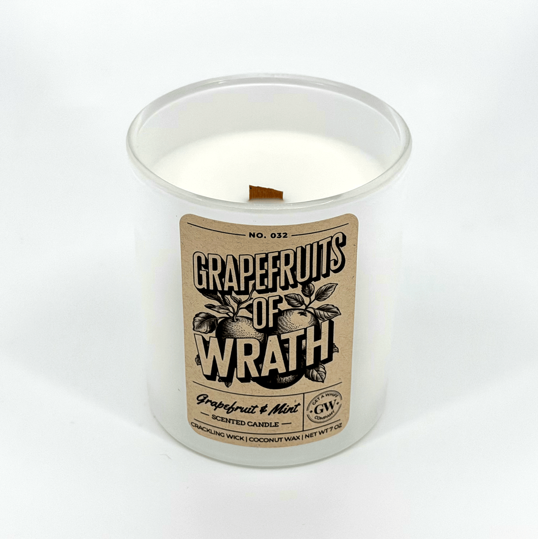 Candle with a label reading &