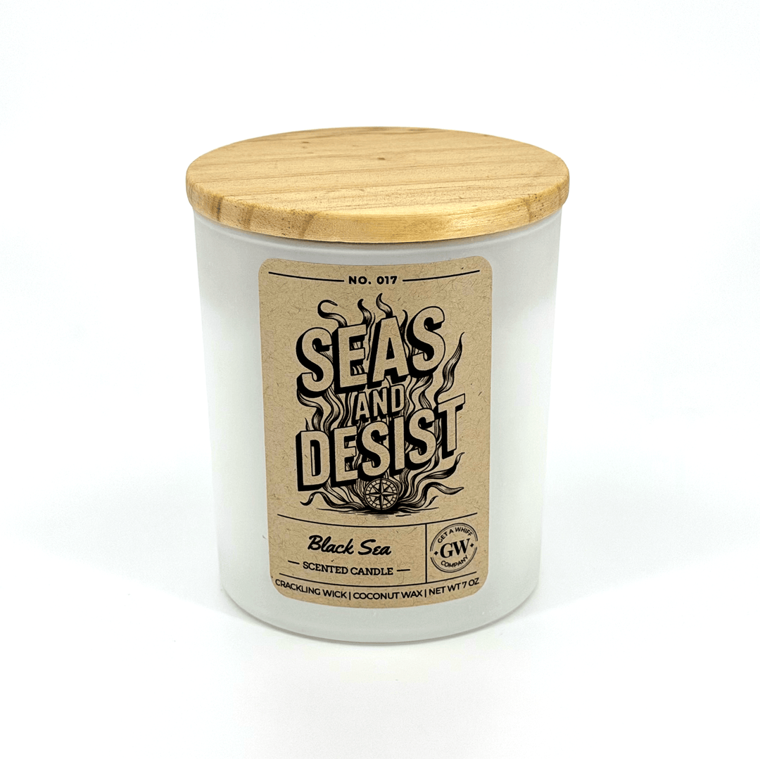Candle with wooden lid and label on a white background