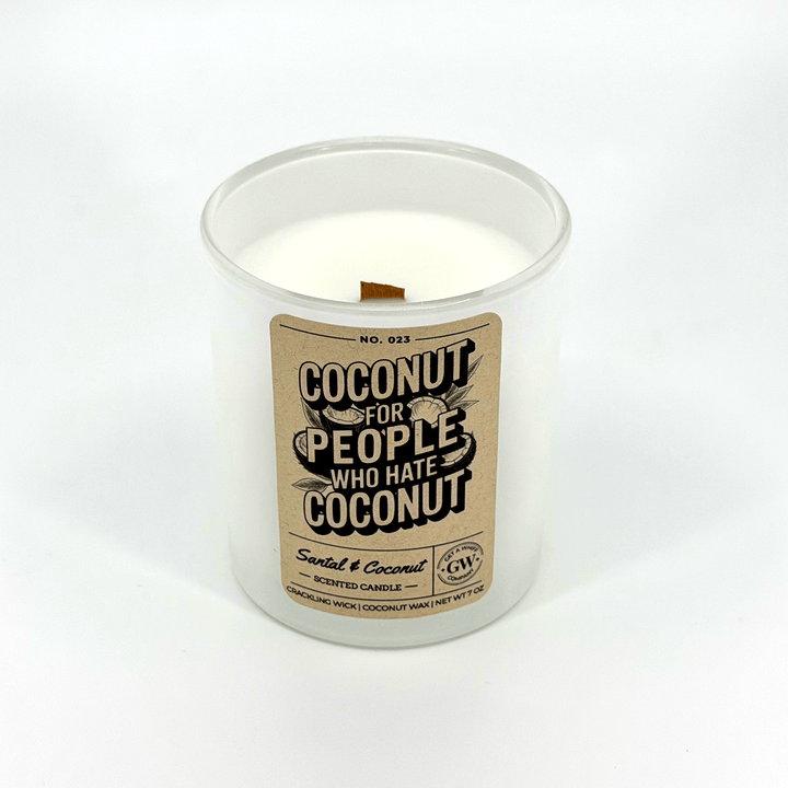 Candle in a white container with a brown label on a white background
