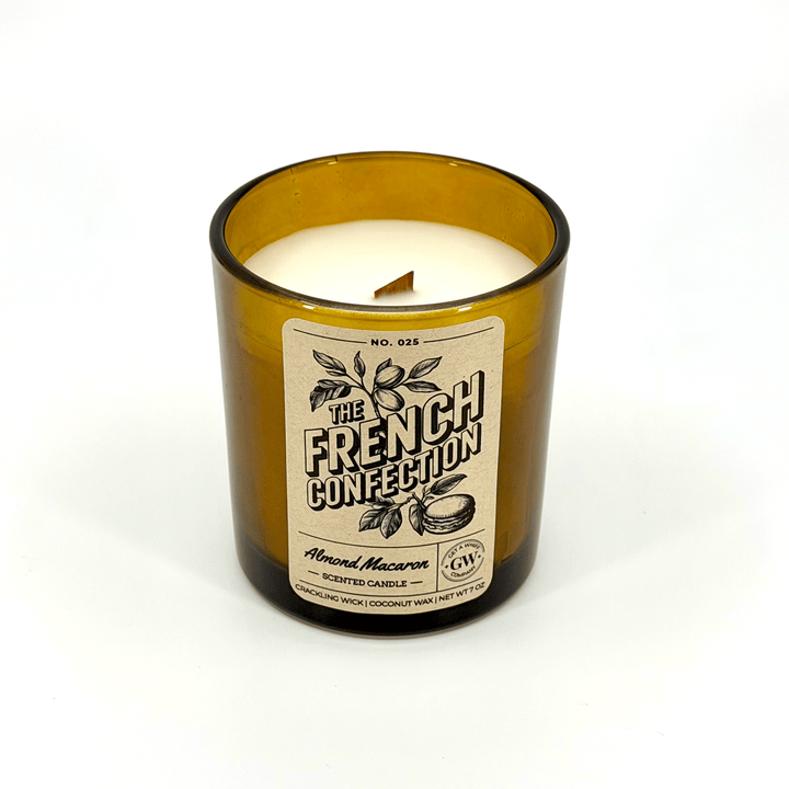 Candle in a glass jar with a label on a white background