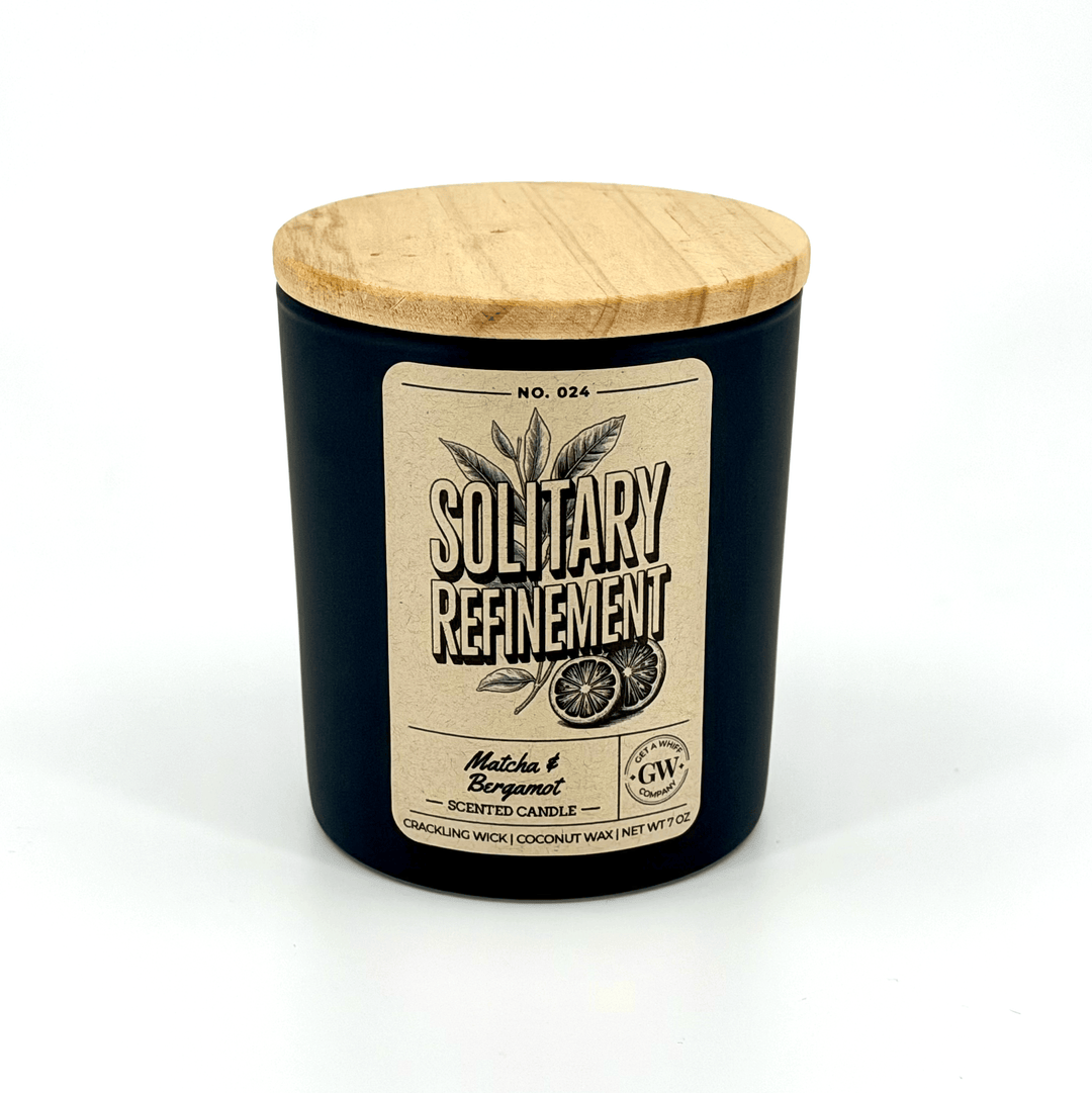 Black candle with wooden lid and &