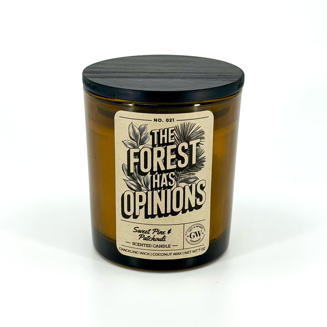 Candle jar with a label reading &