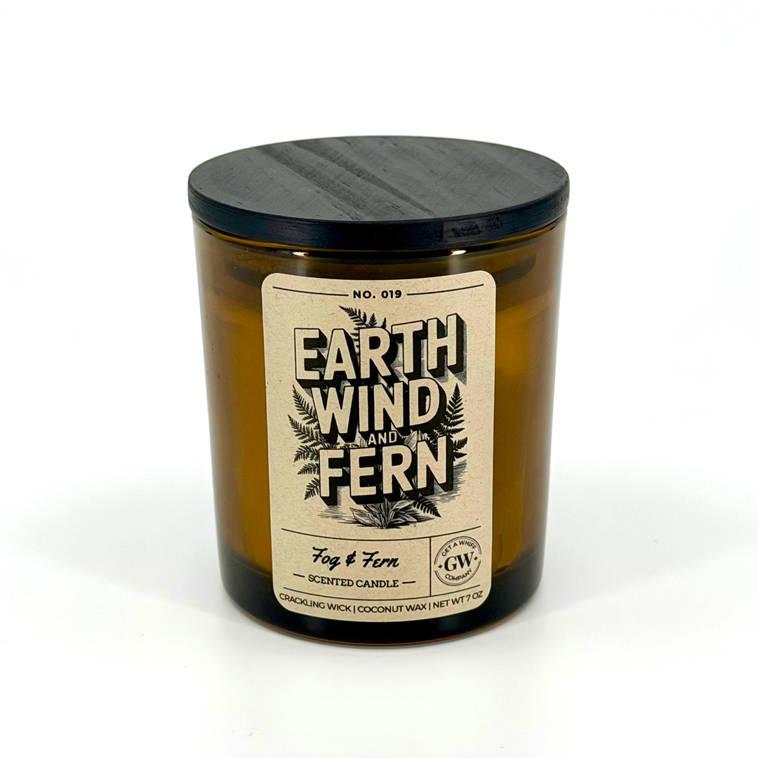 Candle with a label reading &