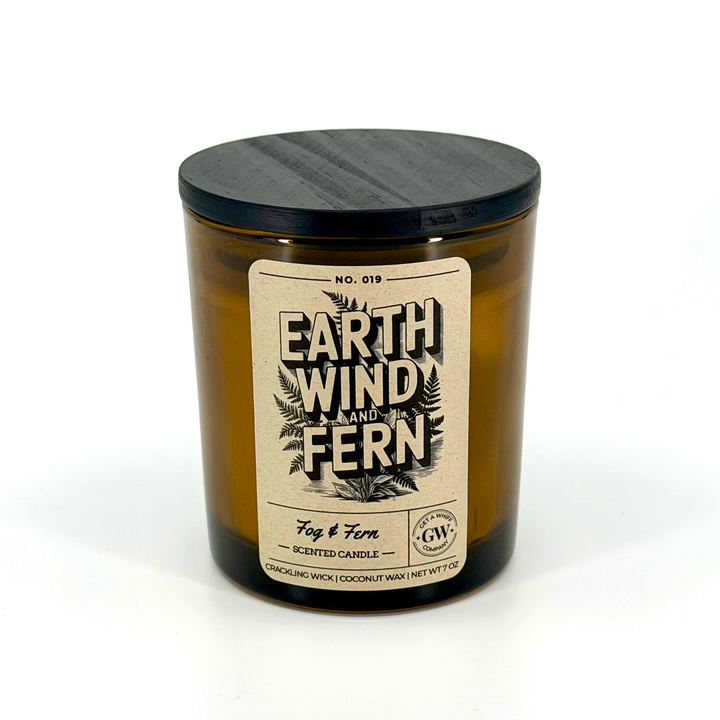 Candle with a label reading &