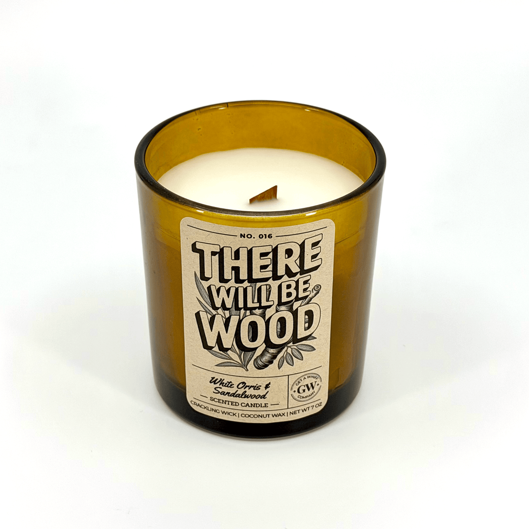 Candle in a bottle with a label on a white background