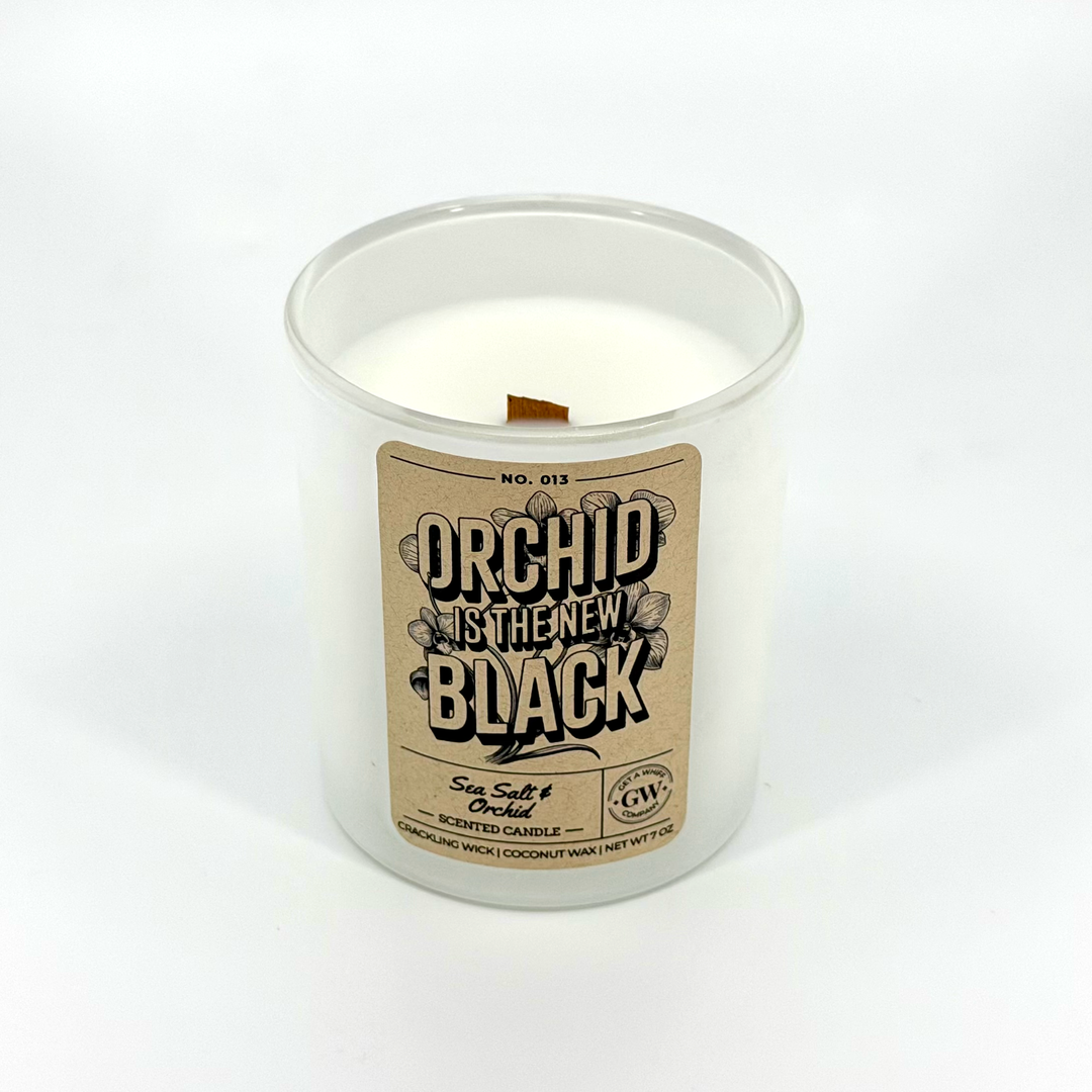Candle with a label on a white background
