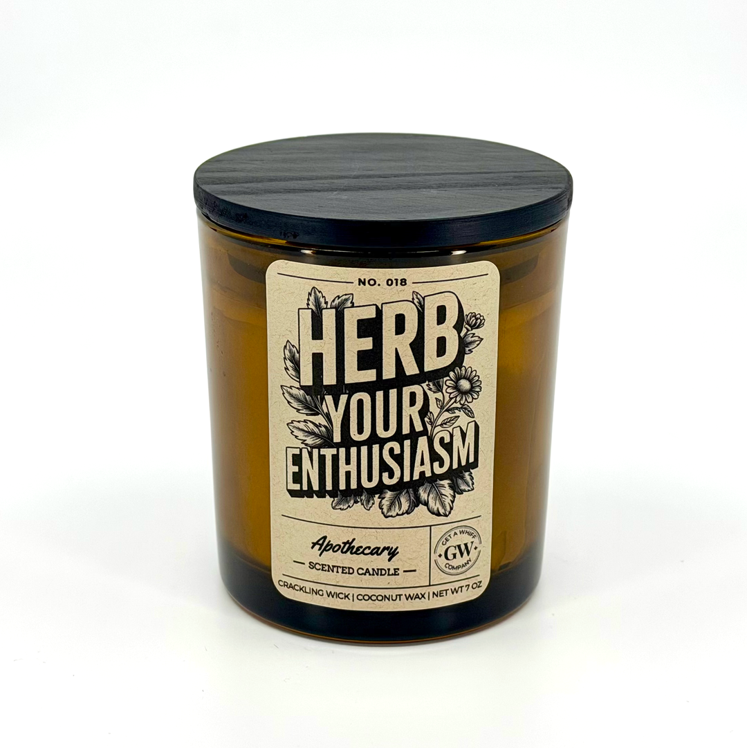Candle with a label reading &