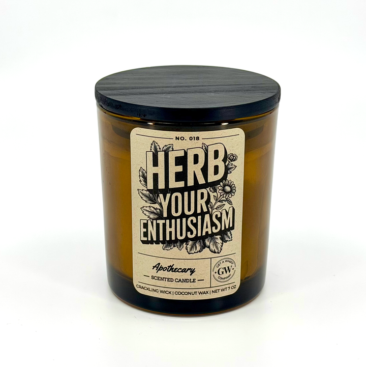 Candle with a label reading &