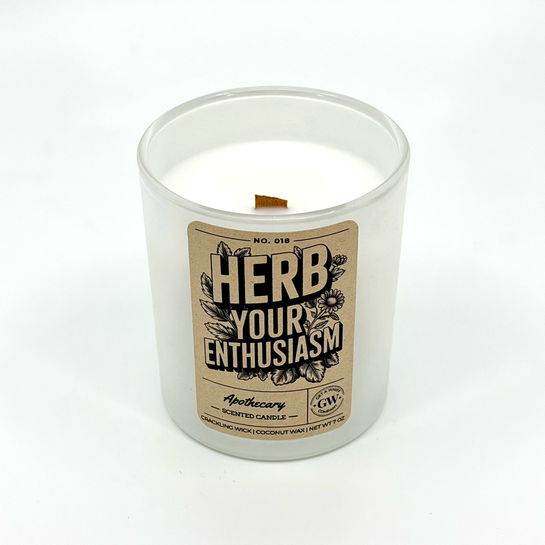 Candle with a label reading &