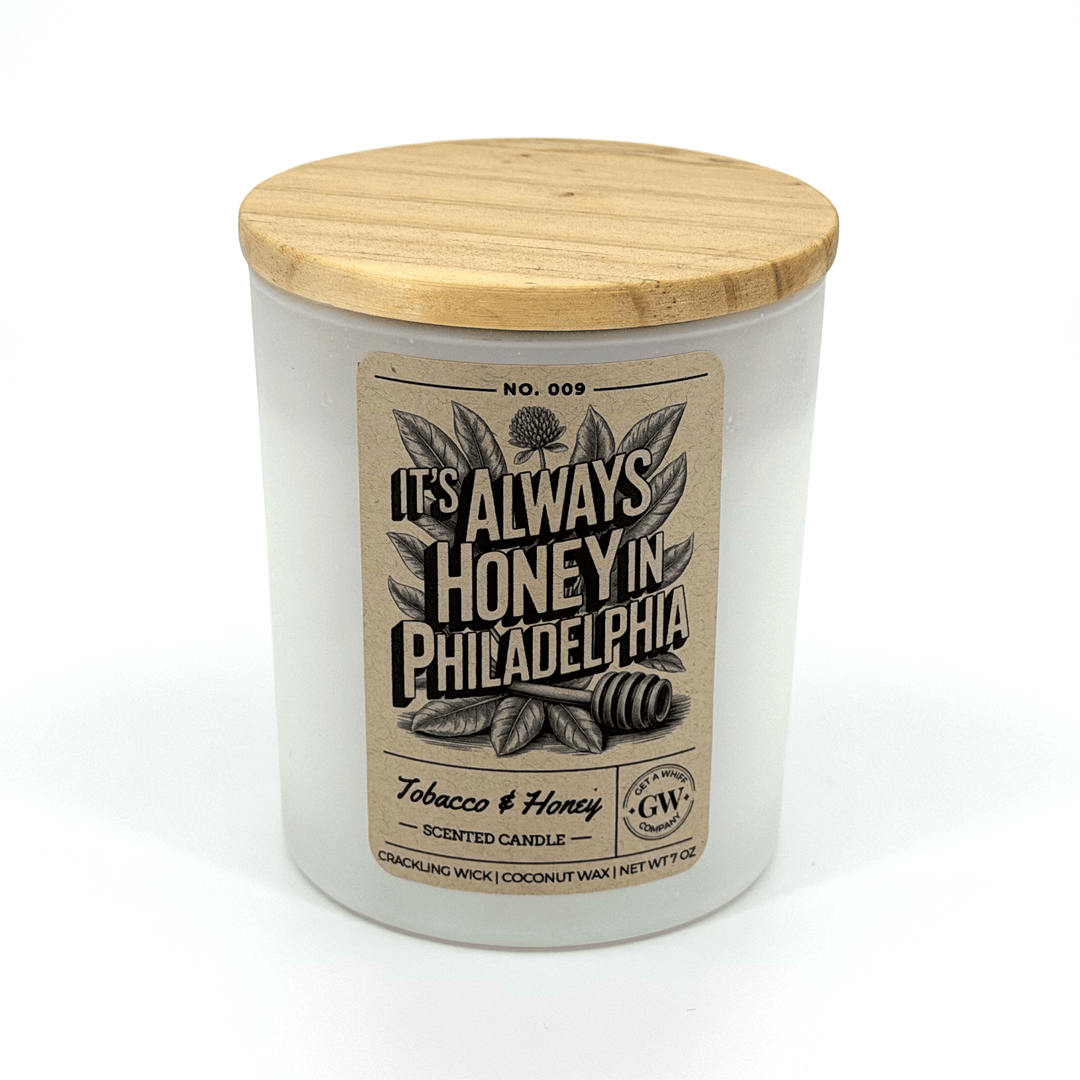 Candle with wooden lid and label on a white background