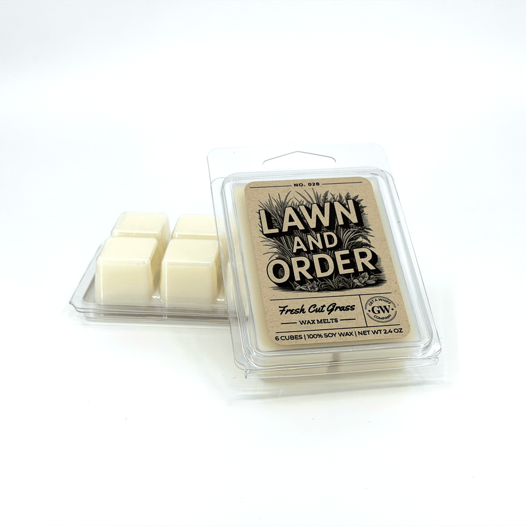 Packaged wax melts with 'Lawn and Order' on a white background