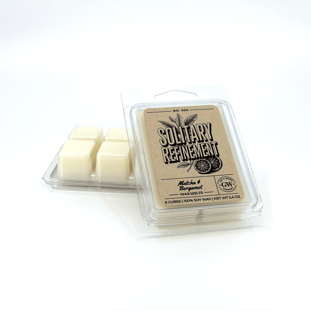 Packaged wax melts with a branded label on a white background