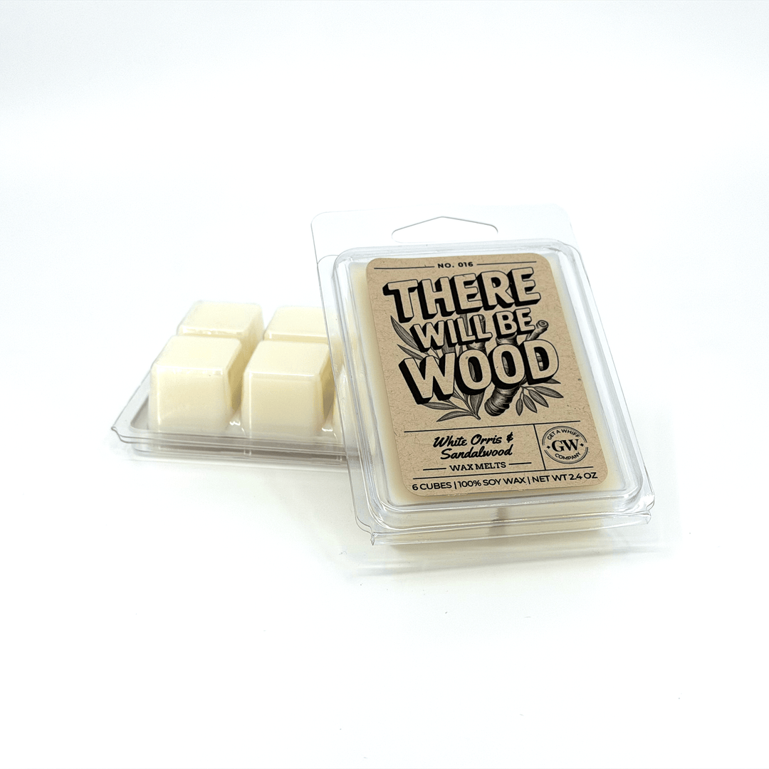 Packaged wax melts with 'There Will Be Wood' branding on a white background