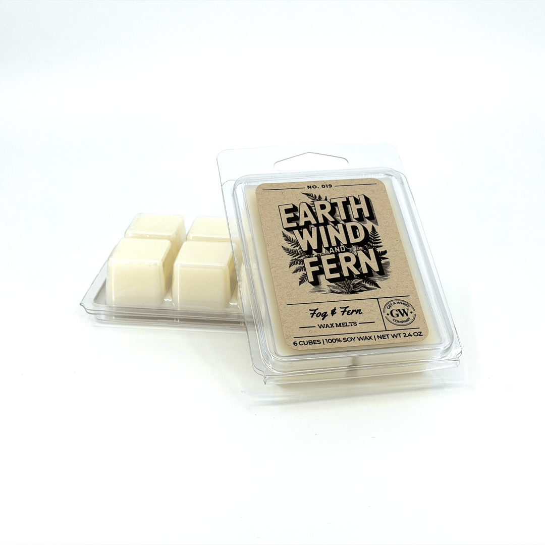 Packaged wax melts with 'Earth Wind & Fern' branding on a white background
