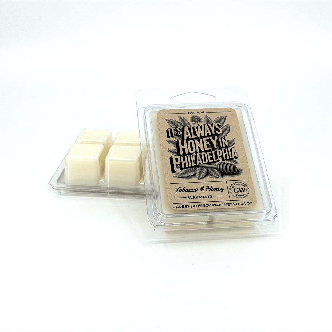 Packaged wax melts with a label on a white background