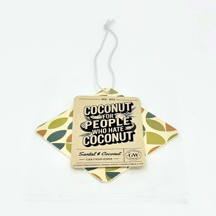 A car freshener tag labeled &